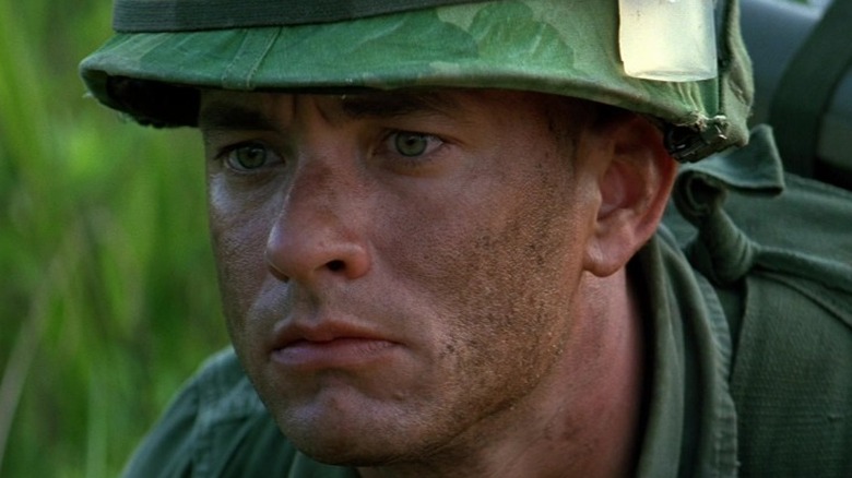 Forrest stares ahead in jungle