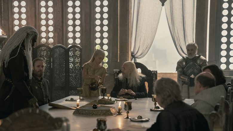 Rhaenyra pours wine
