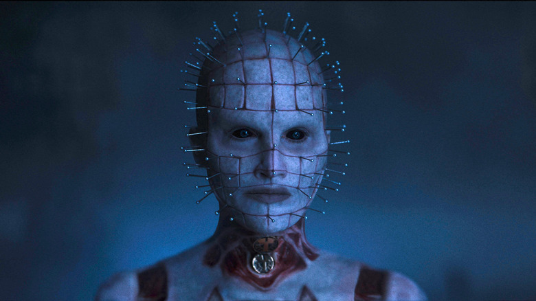 Pinhead standing in mist