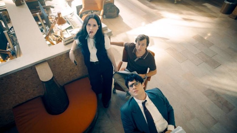Clark, Lois, and Jimmy looking up in Superman (2025)