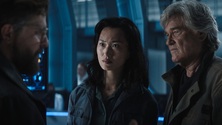 Keiko speaking with Tim and Lee on a Monarch vessel in Monarch: Legacy of Monsters Season 2 (2026)