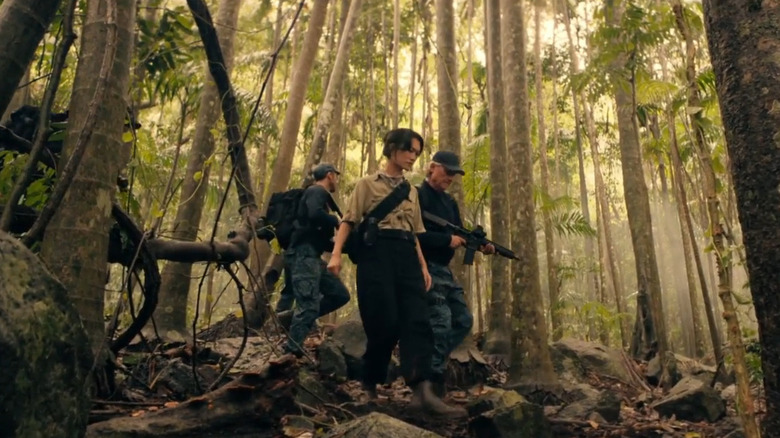 Lee, Kieko, and Monarch operatives traversing the jungles of Skull Island in Monarch: Legacy of Monsters Season 2 (2026)