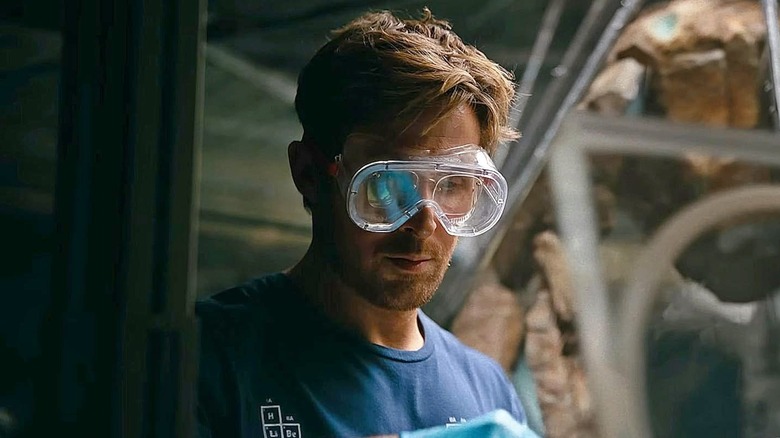 Grace working with Rocky in background in 