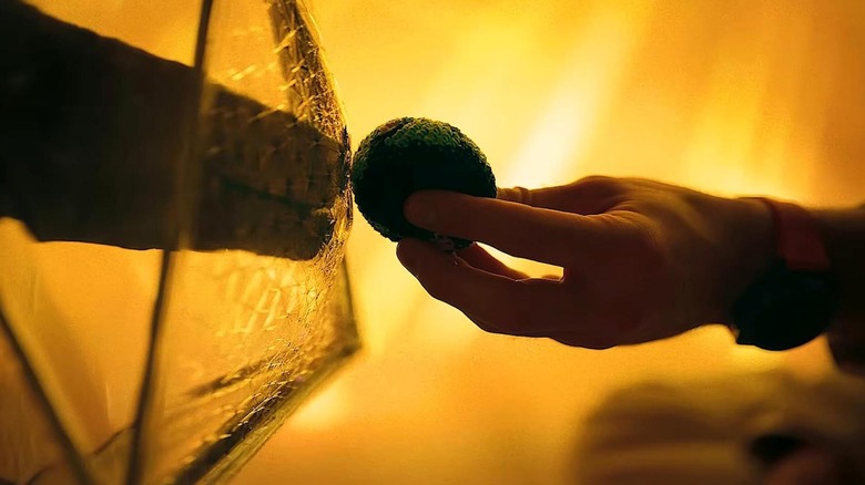 Rocky recieves hacky sack from Grace in "Project Hail Mary" (2026)