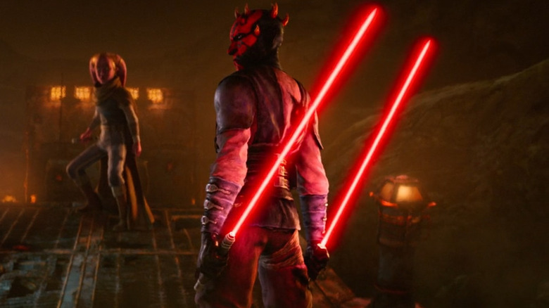 Maul strikes a Starkiller pose with two red lightsabers ignited behind his back in Star Wars: Maul — Shadow Lord (2026)