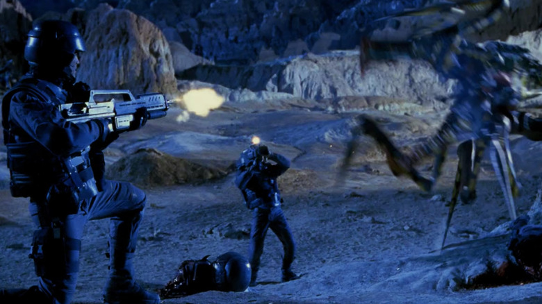 Rico and the cameraman on the battlefield
