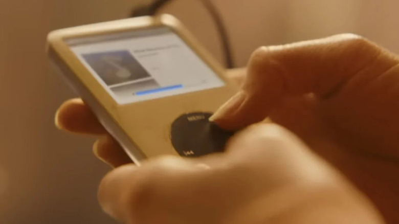 Kara using her iPod in Supergirl (2026)