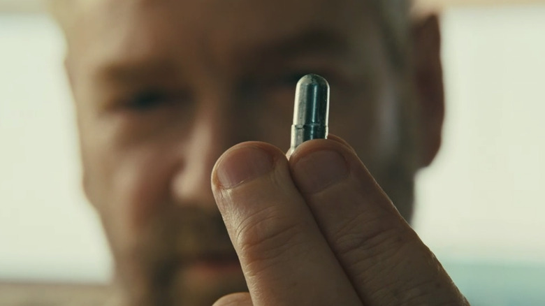 Andrei Sator holding pill