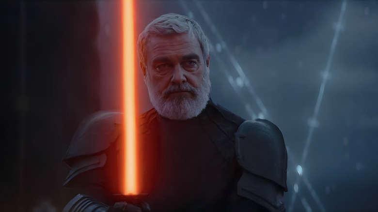 Ray Stevenson's Sith holding lightsaber