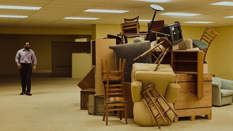 Clark encountering a room of chairs in Backrooms (2026)