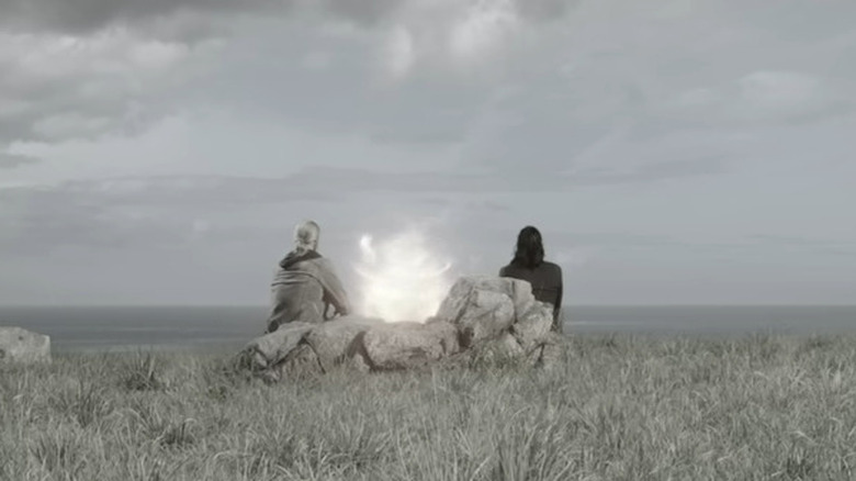 Thor and Loki staring into the distance