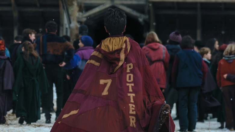 Harry wearing his Quidditch cloak with its number in Harry Potter and the Philosopher's Stone (2026)