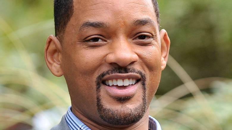 Will Smith smiling outside