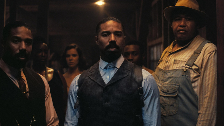 Smoke, Stack, and others assessing potential juke joint newcomers in "Sinners"