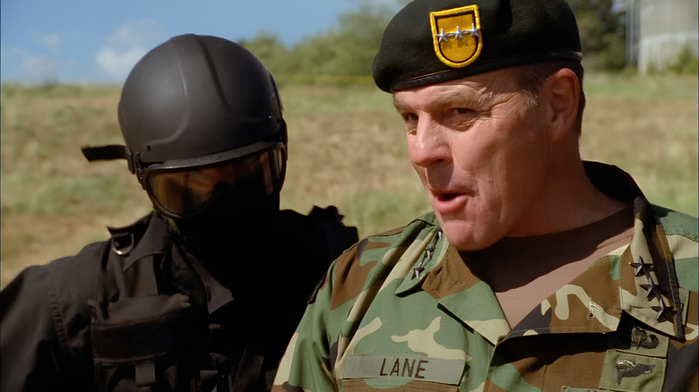 Sam speaks to the soldier