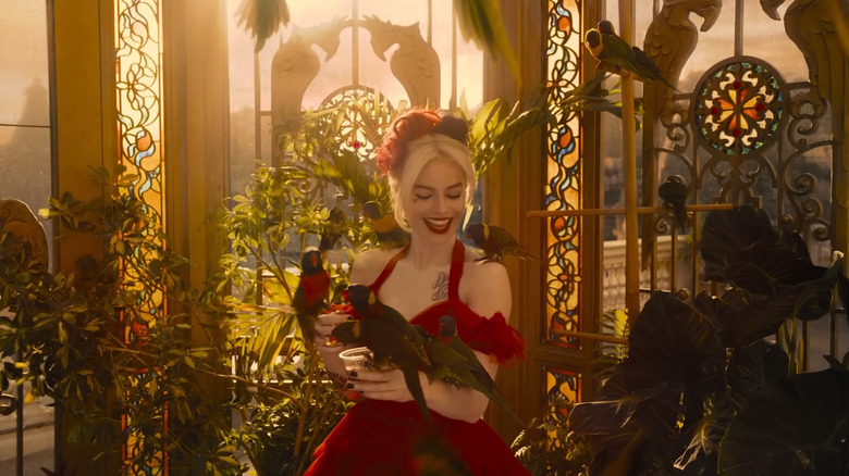 Harley Quinn with parrots in Corto Maltese aviary