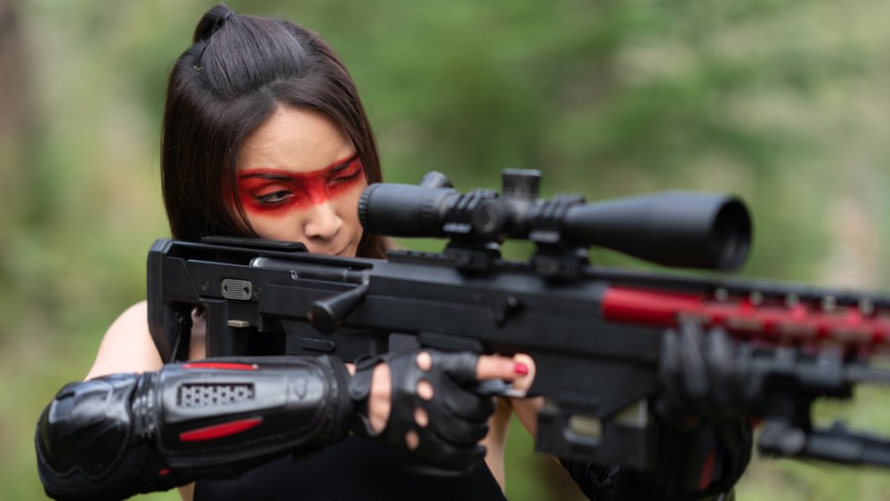 Sayaka Akimoto as Yuki "Lady Death" Mifune in Sniper: Assassin's End