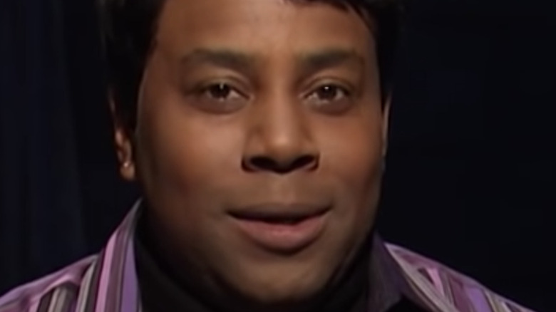 Kenan Thompson looks into camera