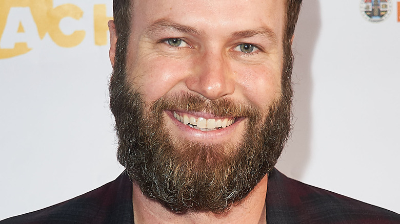 Taran Killam smiling