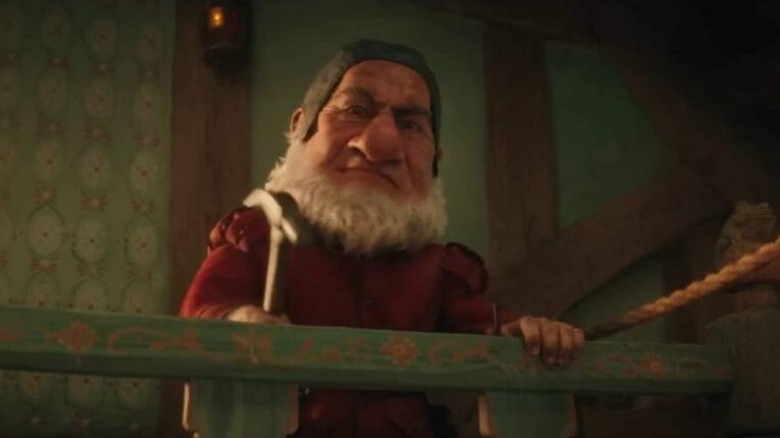 Grumpy holding a hammer in Snow White