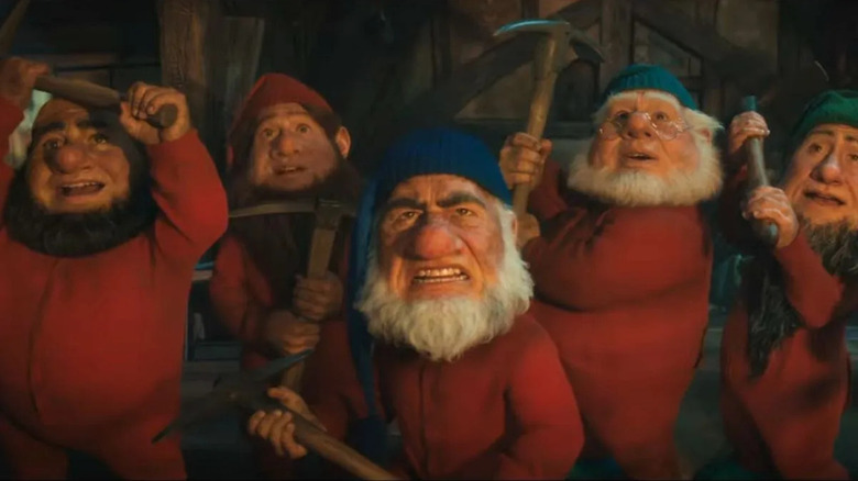 Dwarfs holding pickaxes in Snow White