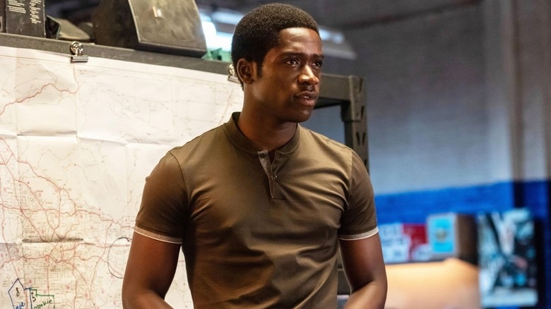 Franklin Saint wearing a tight brown shirt on Snowfall