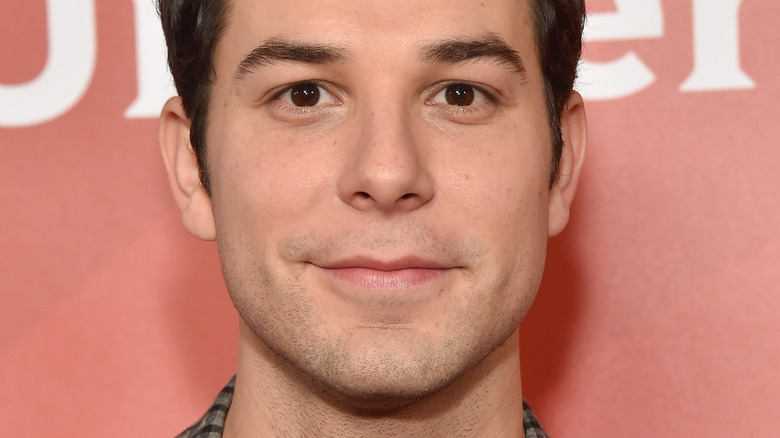 Skylar Astin smiling