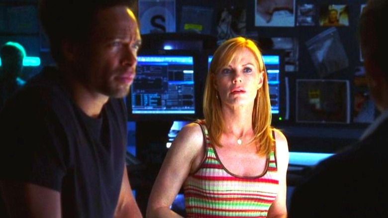 Warrick Brown and Catherine Willows looking serious