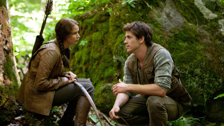 Gale talking to Katniss