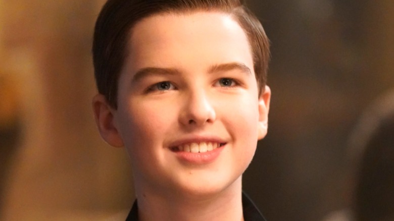 Young Sheldon smiling