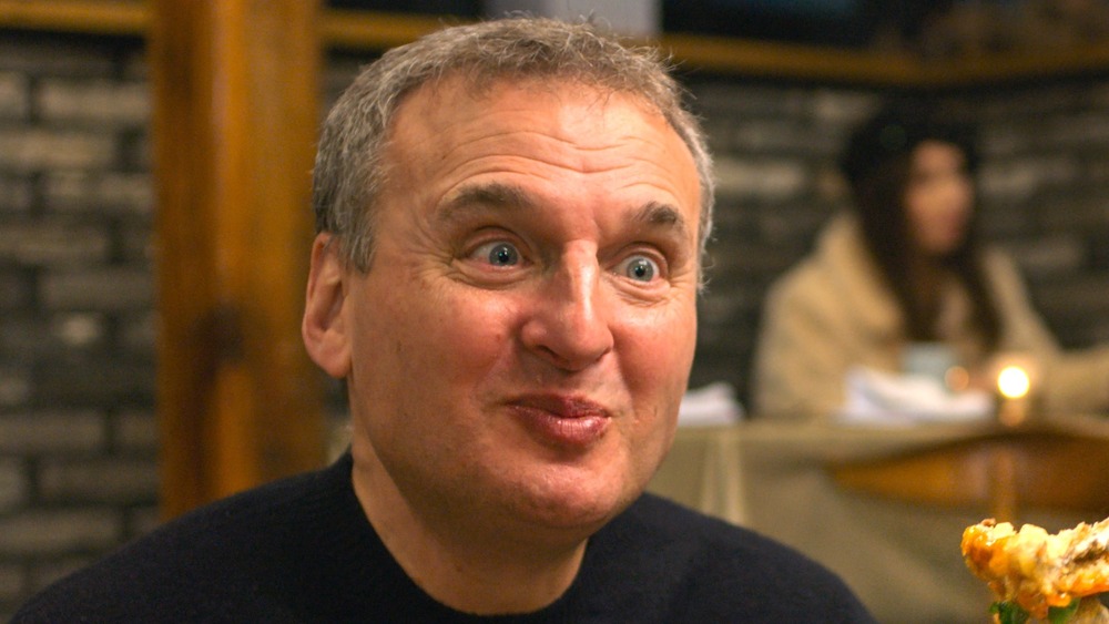 Phil Rosenthal eating happy