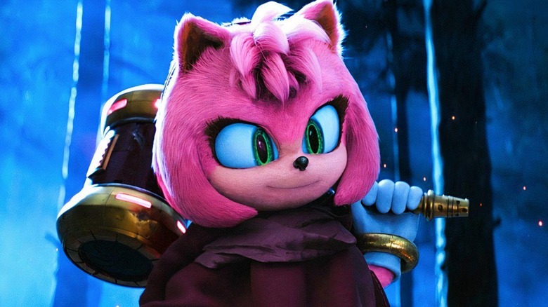 Amy Rose holding her hammer and smirking in Sonic the Hedgehog 3