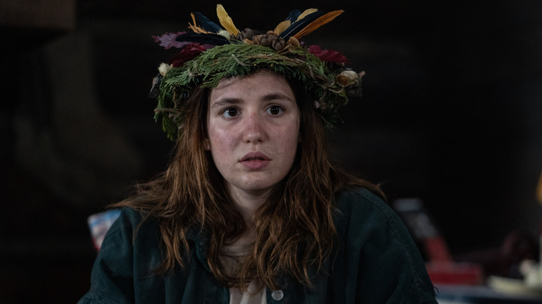 Teen Shauna wears a flower crown