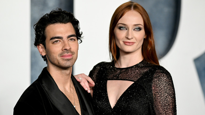 Joe Jonas and Sophie Turner smiling together at the 2023 Vanity Fair Oscar Party