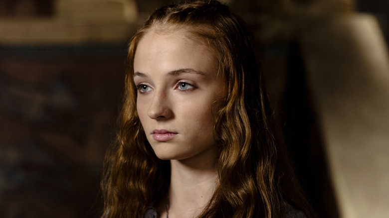Sansa Stark looking solemn on Game of Thrones Season 1