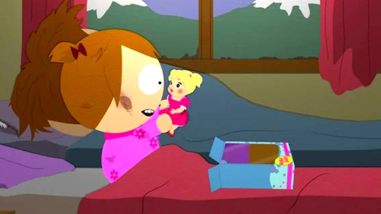 Karen looks at her doll in South Park (1997 - 2026)