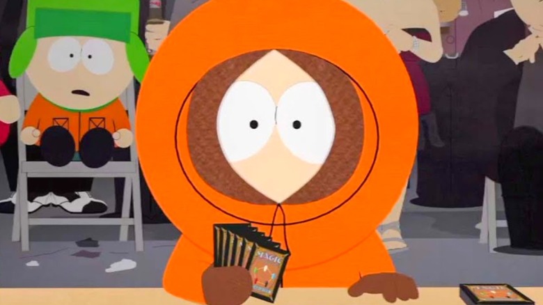 Kenny McCormick holding cards
