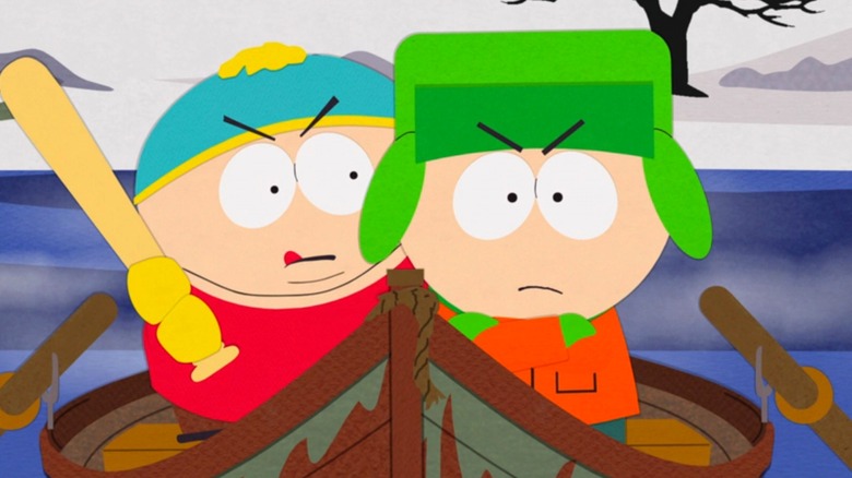Cartman hits Kyle with a nerf bat 