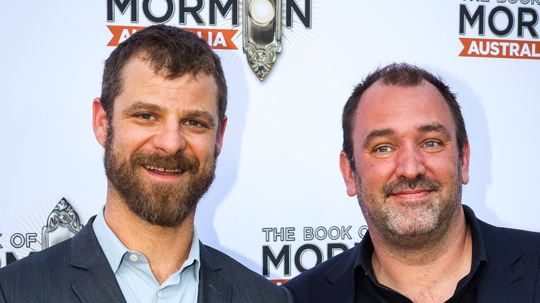 Trey Parker and Matt Stone smile cordially