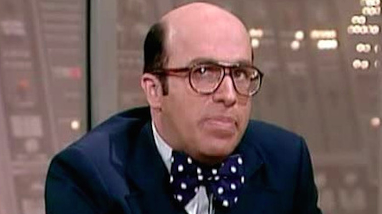 Ken Olfson wears glasses