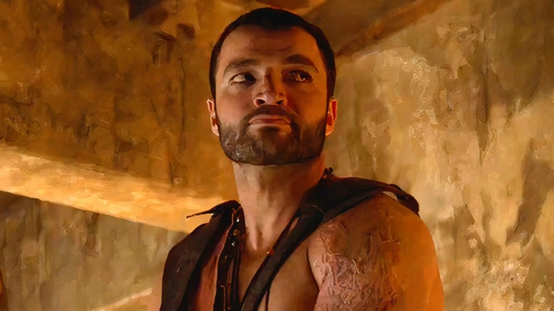 Ashur wearing brown robe