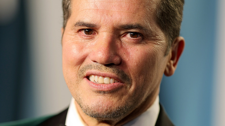 John Leguizamo smiling