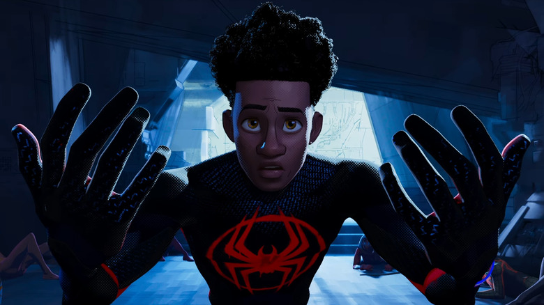Miles Morales holding hands up