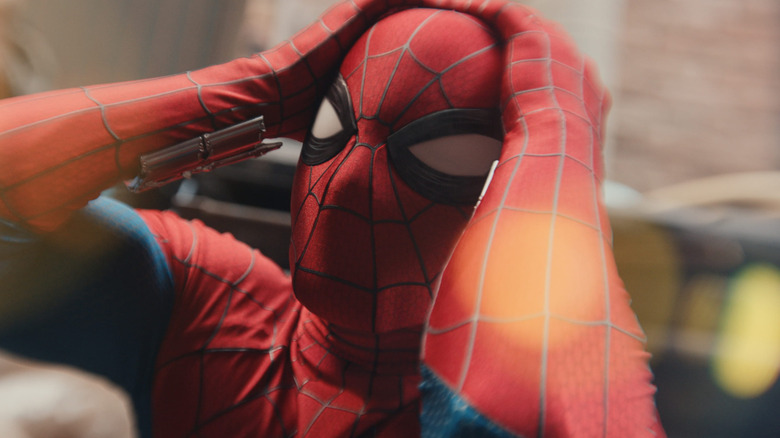 Spider-Man clutching his head in Spider-Man: Brand New Day
