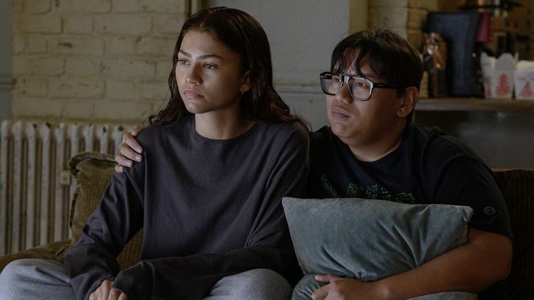 Ned and MJ sitting on couch together in Spider-Man: Brand New Day
