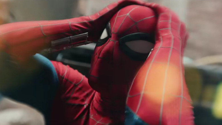 Spider-Man holding his head in Spider-Man: Brand New Day