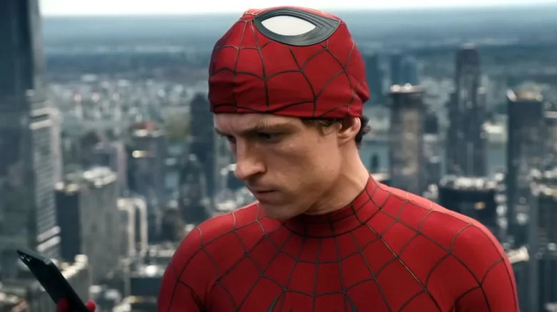 Peter Parker looking at his phone in Spider-Man: Brand New Day