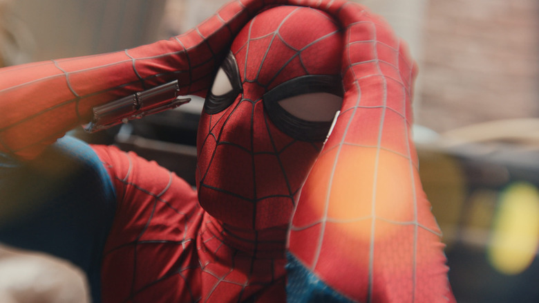 Spider-Man holding his head in Spider-Man: Brand New Day