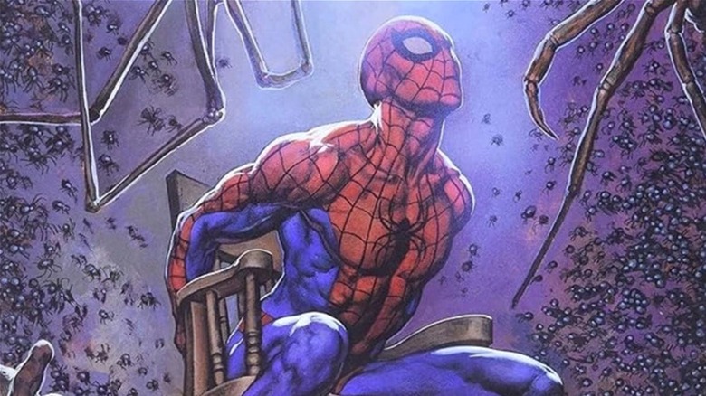 Spider-Man tied to a chair and menaced by spiders in Spider-Man's Tangled Web (2001)
