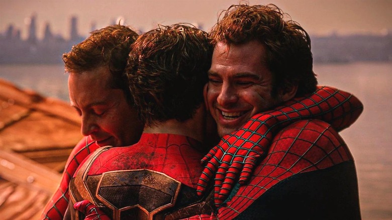 All three movie Spider-Men hugging in Spider-Man: No Way Home (2021)